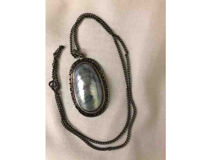 Antique look chain with blue shell pendant