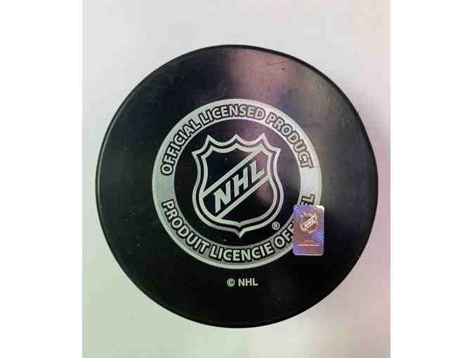 Red Wings Game Puck Autographed by Robby Fabbri
