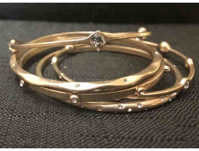 Golden bangle bracelets - by Lia Sophia