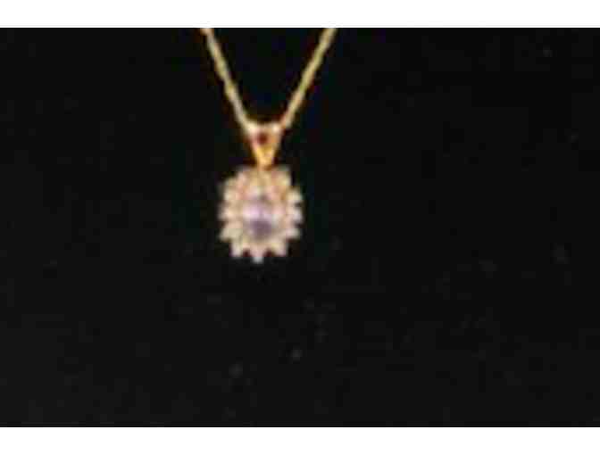 Tanzanite Blue Stone/pendant with diamond stones on 14 k Yellow Gold Chain