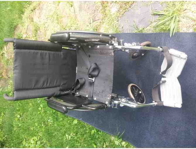 wheel chair folds for car transportation