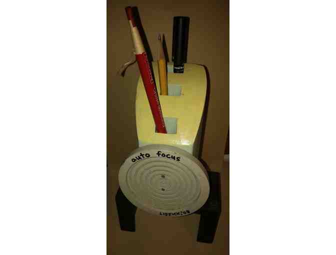 Auto Focus title  a wood sculpture  great as a Pen and pencil  holder too!