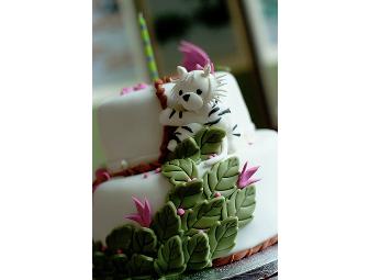 'themed' double tiered fondant cake by Bo Lee