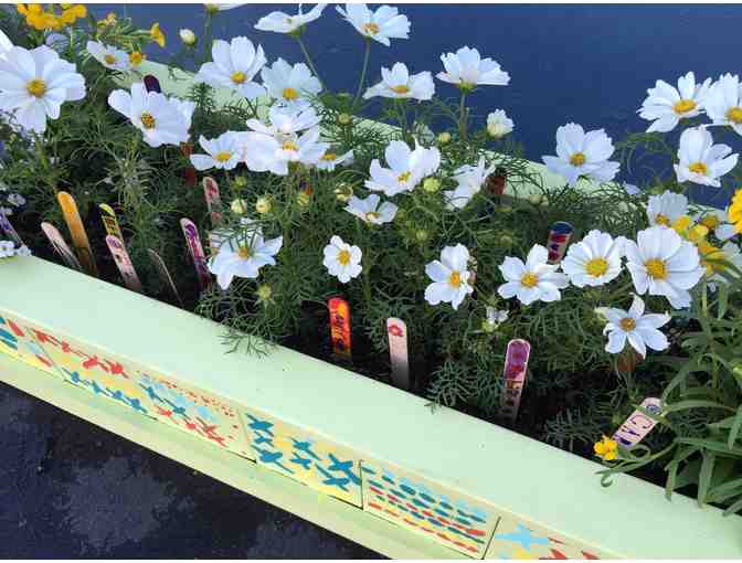 Classroom Art from the students in Ms. Eusebio's class - Wooden planter hand painted