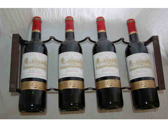 Four Bottles of Bordeaux with Wine Rack