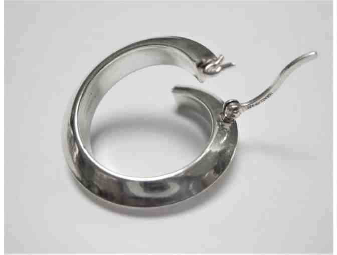 Textured Silver Swirl Hoop Earrings.