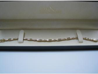 Stunning Gold and Diamond Bracelet from Pav & Broome Jewelry in Gulfport