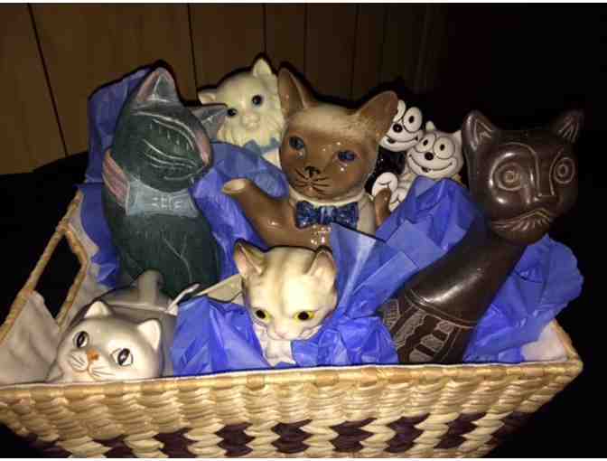 Basket of vintage cat collectibles