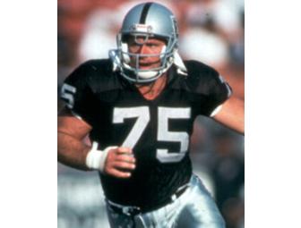 Super Bowl Champion and NFL Hall of Famer Howie Long autographed Football Jersey!