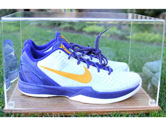 Two autographed shoes by Kobe Bryant