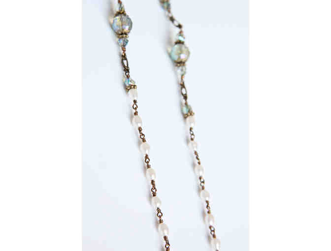 BMHS Principal Ms. Rosemary Libbon's Basket: Seraphym Rosary, 2 Books, and Framed Photos