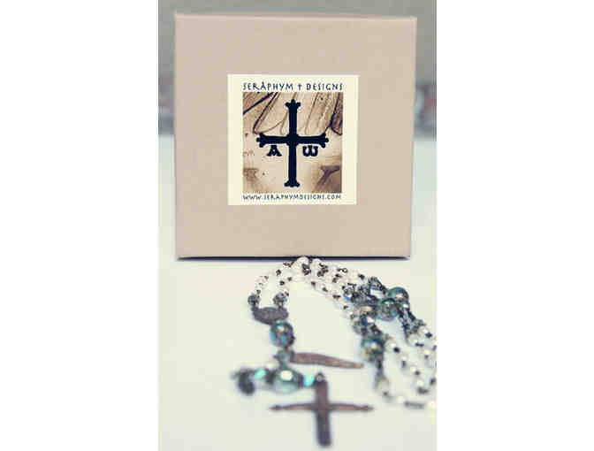 BMHS Principal Ms. Rosemary Libbon's Basket: Seraphym Rosary, 2 Books, and Framed Photos