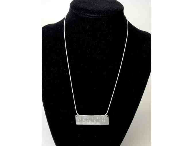 Handmade Inspirational Necklace with 'Strong' Written in Braille