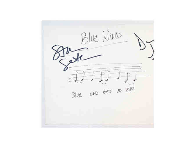 Handwritten and signed 'Blue wind gets so sad' musical phrase from Spring Awakening