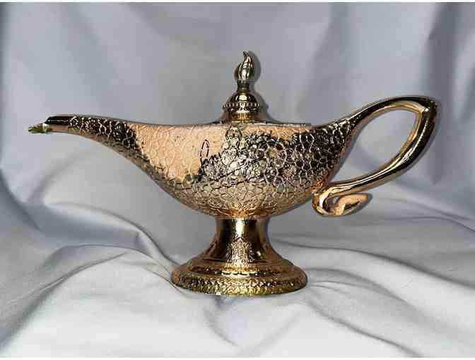 Signed Genie's lamp prop from Aladdin