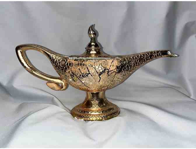 Signed Genie's lamp prop from Aladdin