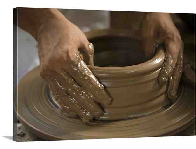 Two person wheel class with teacher at The Clayroom