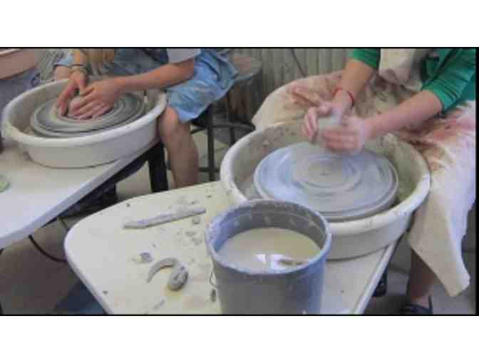Two person wheel class with teacher at The Clayroom