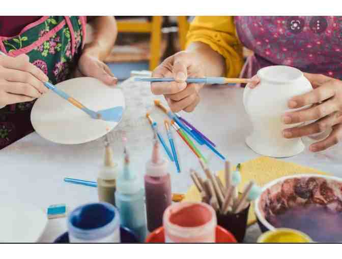 Two person wheel class with teacher at The Clayroom