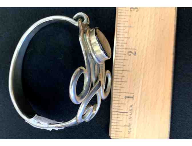 Sterling Silver Bangle Bracelet with a Large Black Stone