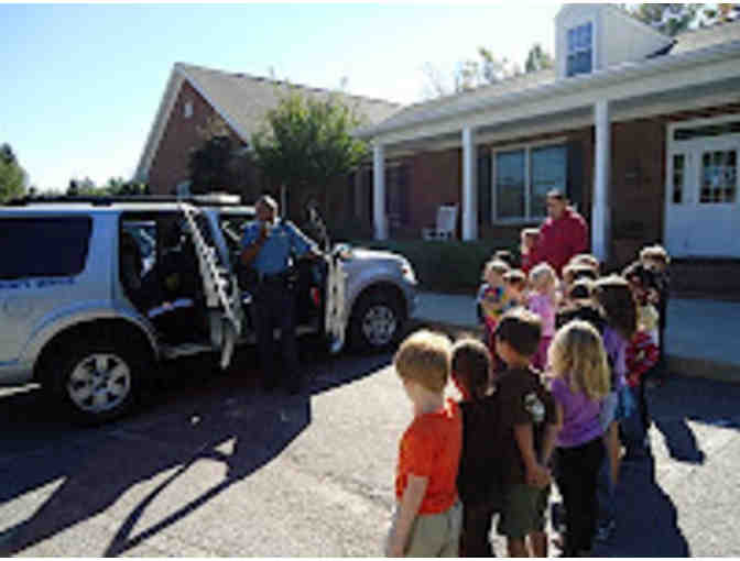 Ride In A Police Cruiser: To School or In Town