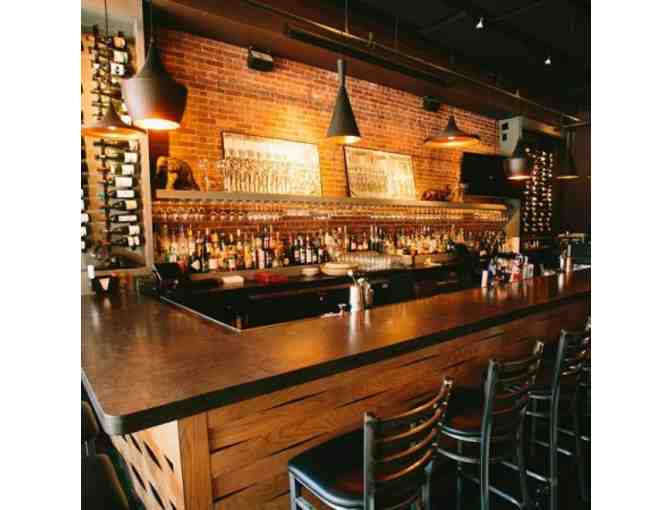 $100 Gift Certificate to the Elephant Walk South End Restaurant + two EW cookbooks