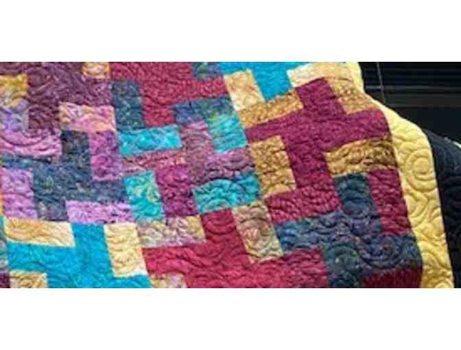 Multi colored Quilt Made by Marilyn Marshall