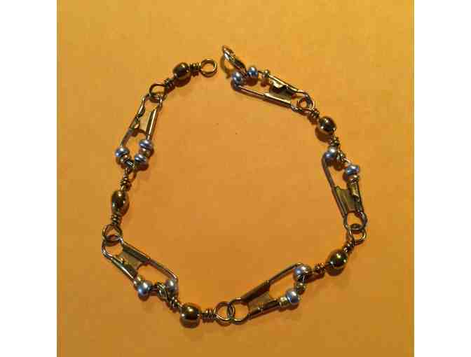 Two Brass Swivel bracelets with silver and gold beads