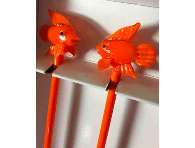 Wine glasses and drink stirrers