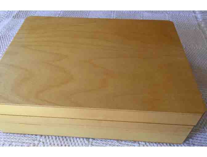 Wood box filled with flies