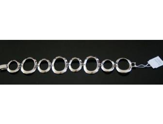 Paradox Bracelet & Earrings by Lia Sophia