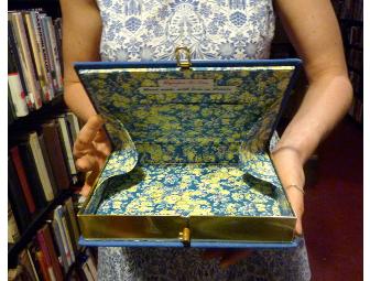 Olympia Le-Tan Moliere Book Clutch, as seen on Natalie Portman & Michelle Williams