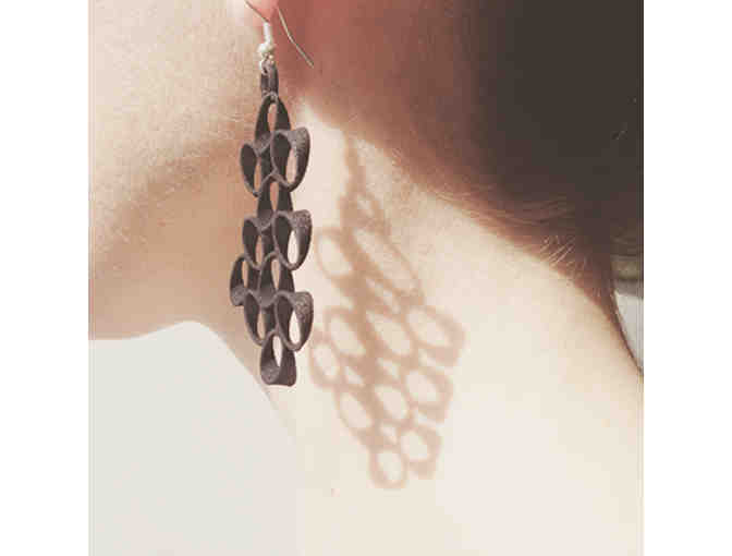 3D printed jewelry designed by New York design and architecture practice e+i studio.