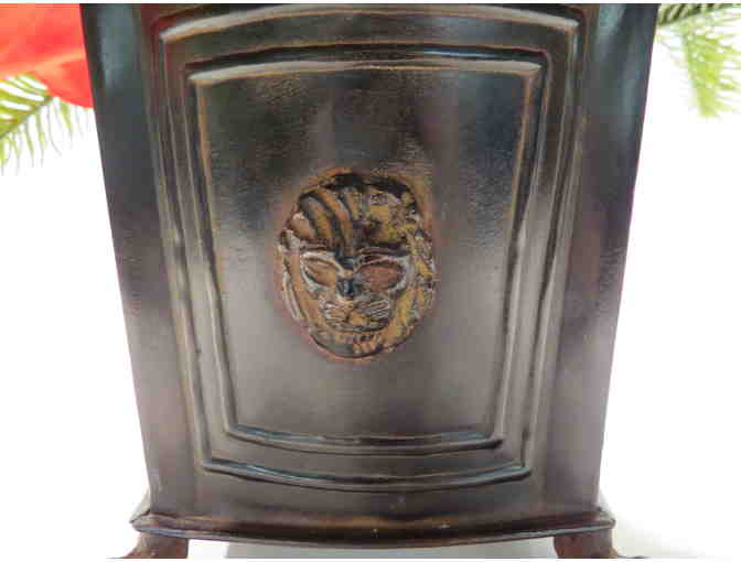 Amaryllis and Cedar in Lion Head Cache Pot
