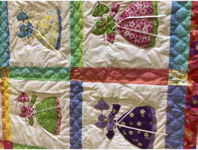 Hand-quilted Bonnet Girl Quilt created by Ellen Jack