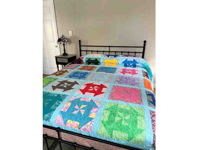 Stunning extra large handmade quilt with large pinwheels