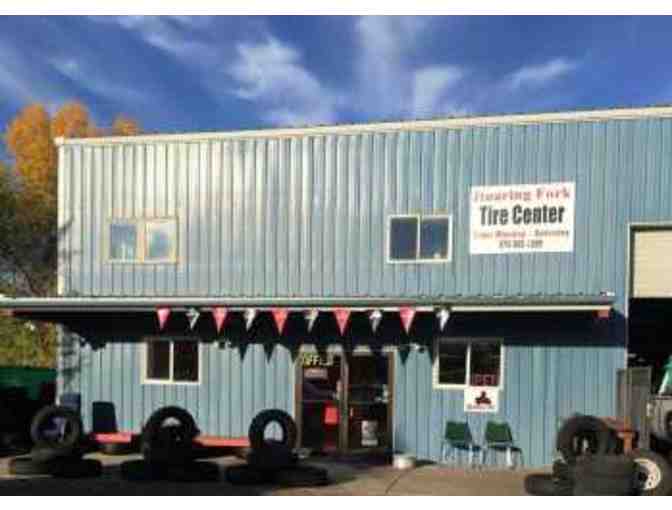 Full Service Synthetic Oil Change with rotation and balance at Roaring Fork Tire - Photo 1
