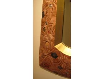 Carved and painted basswood mirror by Brent Skidmore