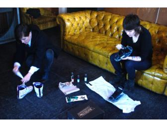 Tegan and Sara decorate a pair of their signature shoes in Black