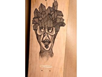 Kevin 'Spanky' Long decorates his own skateboard