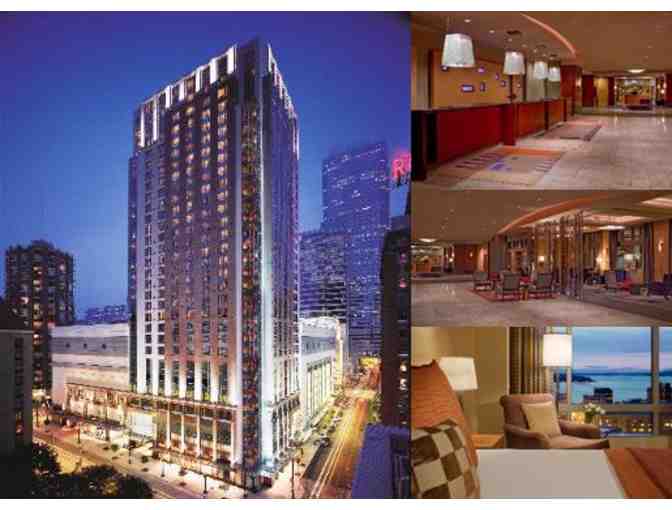 Ariana Grande in Seattle with a 3 Night Stay at the Grand Hyatt Seattle & Airfare for (2)