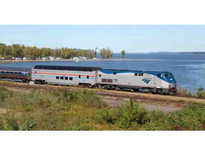 FOUR ROUND-TRIP TICKETS ON THE DOWNEASTER