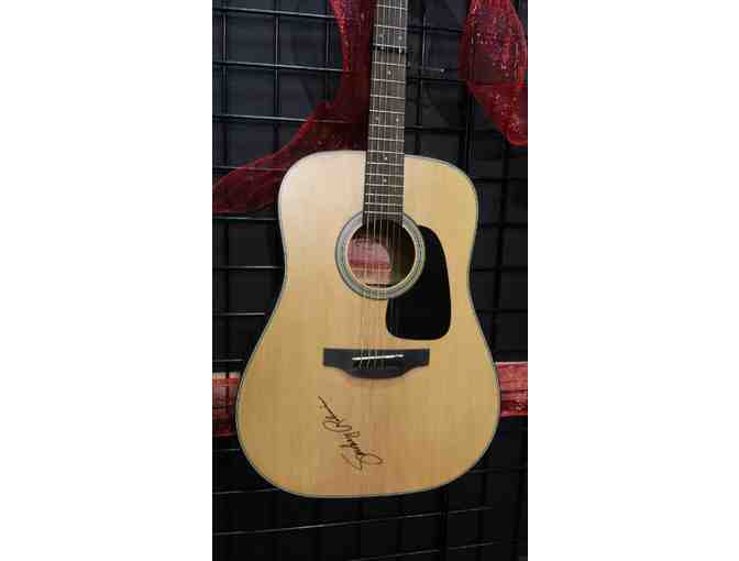 Guitar autographed by Smokey Robinson