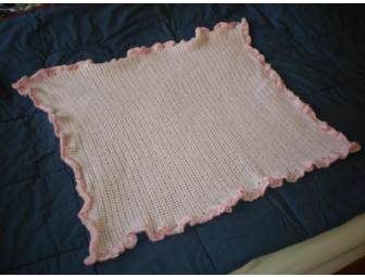 Hand-crocheted pink baby blanket