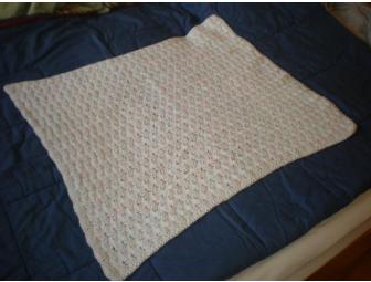 Hand-crocheted blue and pink baby blanket