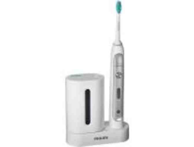 Philips Sonicare rechargeable toothbrush with two extra brush heads