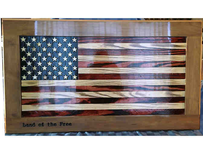 US flag art made from wood fragments reclaimed from Easton reconstruction projs.