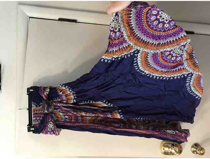NEW: A long skirt in dark blue with purple and orange flower pattern.