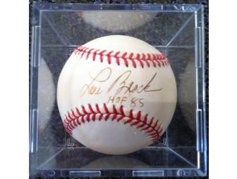 Signed baseball with collector's card by Lou Brock St. Louis Cardinals, Hall of Fame