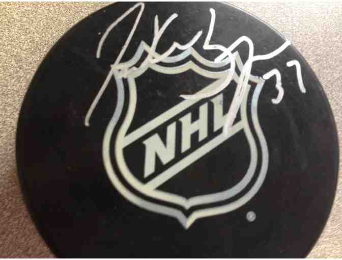 NHL puck signed by Patrice Bergeron of Boston Bruins